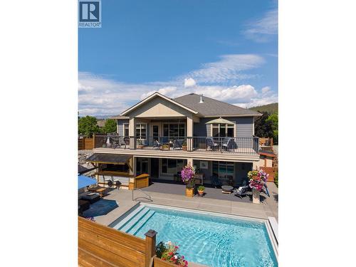 12931 East Ridge Drive, Lake Country, BC - Outdoor With In Ground Pool With Deck Patio Veranda