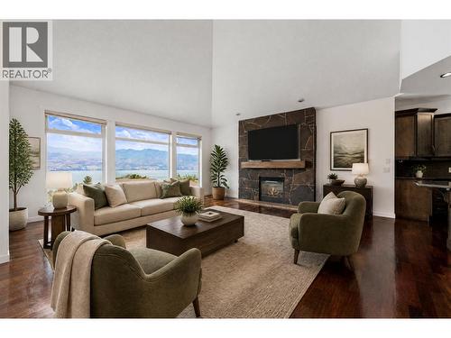 Upper Living - virtually staged - 1581 Gregory Road, West Kelowna, BC - Indoor Photo Showing Living Room With Fireplace