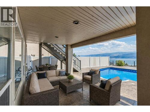Lower Deck - virtually staged - 1581 Gregory Road, West Kelowna, BC - Outdoor With In Ground Pool With Deck Patio Veranda With Exterior