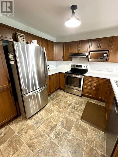 Fridge, Stove, Dishwasher & Hood Fan Included - 14 Otteridge Avenue, Renfrew, ON - Indoor Photo Showing Kitchen With Double Sink