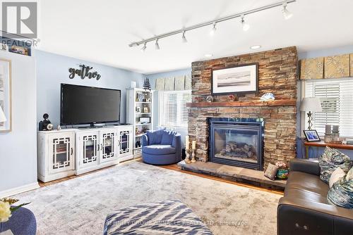 26980 Cedarhurst Beach Road, Brock, ON - Indoor Photo Showing Living Room With Fireplace