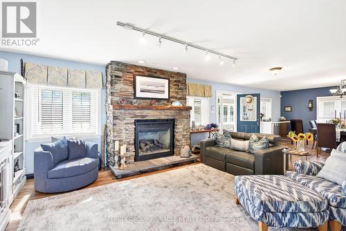 26980 Cedarhurst Beach Road, Brock, ON - Indoor Photo Showing Living Room With Fireplace