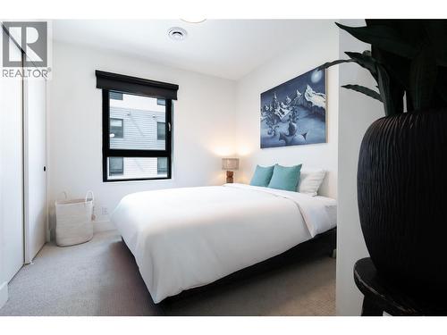 1701 Coursier Avenue Unit# 2213, Revelstoke, BC - Indoor Photo Showing Bedroom