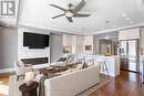 Virtually staged - 216 Rebecca Street, Oakville, ON  - Indoor With Fireplace 