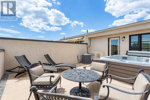 Virtually staged - 216 Rebecca Street, Oakville, ON - Outdoor With Deck Patio Veranda