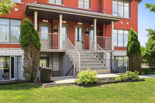 Front of Structure - 7555 Boul. Cousineau, Longueuil (Saint-Hubert), QC - Outdoor With Deck Patio Veranda With Facade