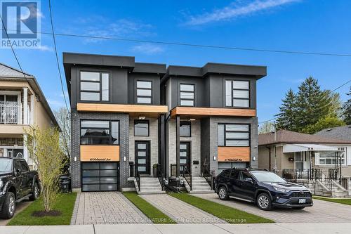 Refined contemporary style: w warm, inviting feel - 69 Holmstead Avenue, Toronto, ON - Outdoor With Facade