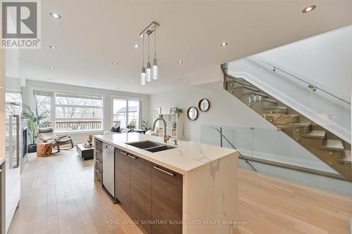 Waterfall island / breakfast bar - 69 Holmstead Avenue, Toronto, ON - Indoor Photo Showing Kitchen With Double Sink With Upgraded Kitchen