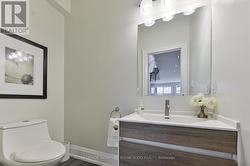 Tucked away main floor powder room - 