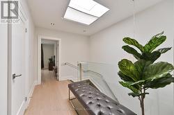 Wide hall on 2nd level w skylight - 