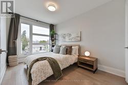Front East bdrm: sun filled space & double closets - 