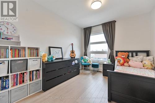 Front West Bdrm: double closets - 69 Holmstead Avenue, Toronto, ON - Indoor Photo Showing Bedroom