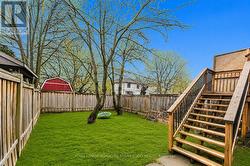 Fenced off yard safe for kids and dogs to play - 