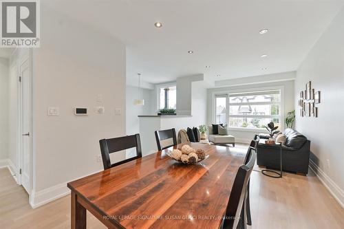 Living room O/L dining for seamless entertaining - 69 Holmstead Avenue, Toronto, ON - Indoor Photo Showing Other Room