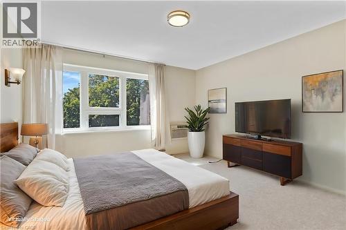 Staged Primary Bedroom - 26 Wentworth Avenue Unit# 2 S, Cambridge, ON - Indoor Photo Showing Bedroom