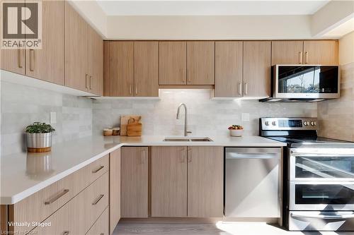 Staged Kitchen - 26 Wentworth Avenue Unit# 2 S, Cambridge, ON - Indoor Photo Showing Kitchen With Upgraded Kitchen