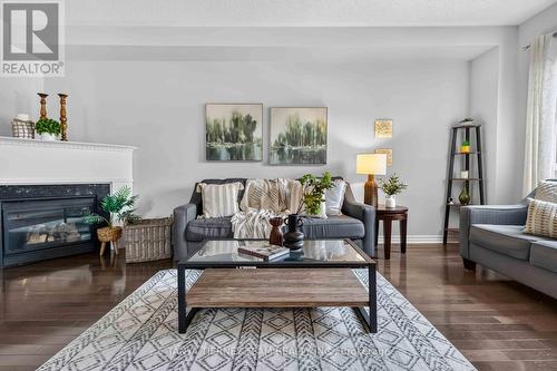 53 Chiswick Avenue, Whitby, ON - Indoor Photo Showing Living Room With Fireplace