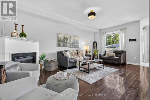 53 Chiswick Avenue, Whitby, ON - Indoor Photo Showing Living Room With Fireplace