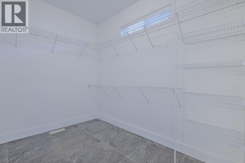 Walk-in closet - 755 Birch Avenue, Kelowna, BC - Indoor With Storage