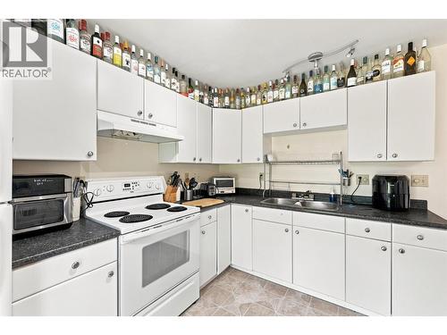 643 Mcbeth Place Unit# 106, Kamloops, BC - Indoor Photo Showing Kitchen With Double Sink