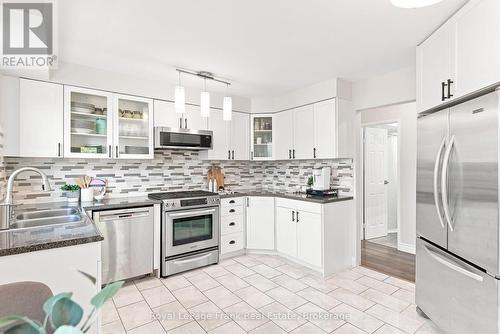 59 Centerfield Drive, Clarington (Courtice), ON - Indoor Photo Showing Kitchen With Stainless Steel Kitchen With Double Sink With Upgraded Kitchen