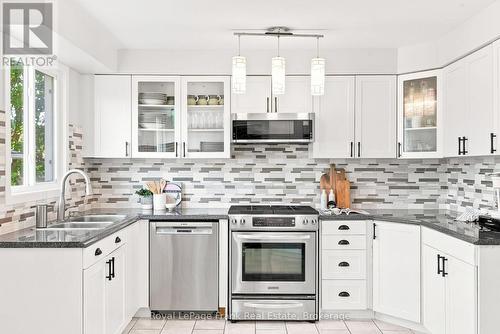 59 Centerfield Drive, Clarington (Courtice), ON - Indoor Photo Showing Kitchen With Stainless Steel Kitchen With Double Sink With Upgraded Kitchen