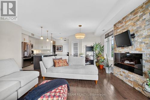 304 - 170 Guelph Private, Ottawa, ON - Indoor Photo Showing Living Room With Fireplace
