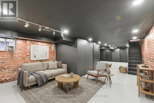 Basement rec room (virtually staged) - 669 Greenwood Avenue, Toronto, ON - Indoor