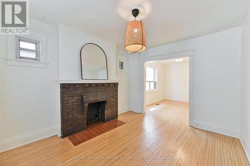 Living room - 669 Greenwood Avenue, Toronto, ON - Indoor Photo Showing Living Room With Fireplace