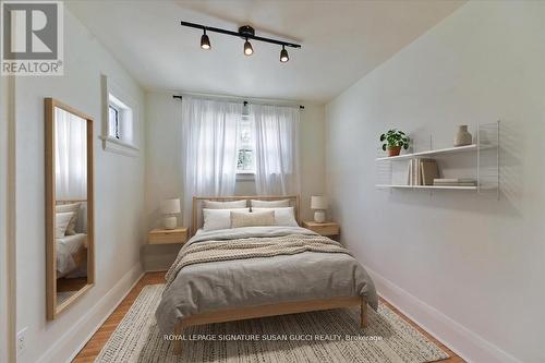 Bedroom 1 main flr or office (virtually staged) - 669 Greenwood Avenue, Toronto, ON - Indoor Photo Showing Bedroom