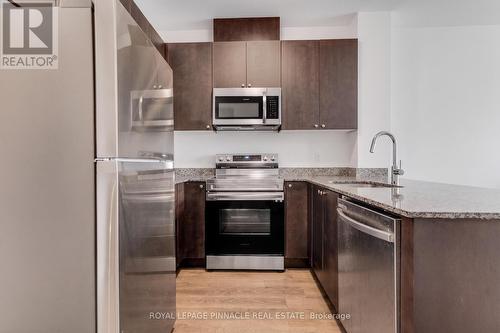 209 - 460 Gordon Krantz Avenue, Milton, ON - Indoor Photo Showing Kitchen With Stainless Steel Kitchen With Upgraded Kitchen