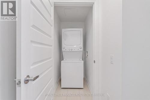 209 - 460 Gordon Krantz Avenue, Milton, ON - Indoor Photo Showing Laundry Room