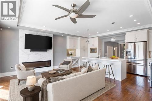 Virtually staged - 216 Rebecca Street, Oakville, ON - Indoor With Fireplace