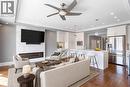 Virtually staged - 216 Rebecca Street, Oakville, ON  - Indoor With Fireplace 