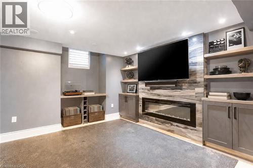 Virtually staged - 216 Rebecca Street, Oakville, ON - Indoor With Fireplace