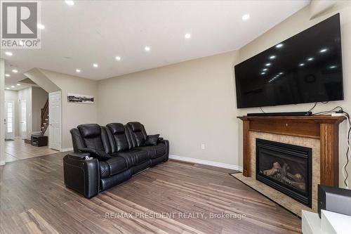 285 Southbrook Drive, Hamilton, ON - Indoor Photo Showing Living Room With Fireplace
