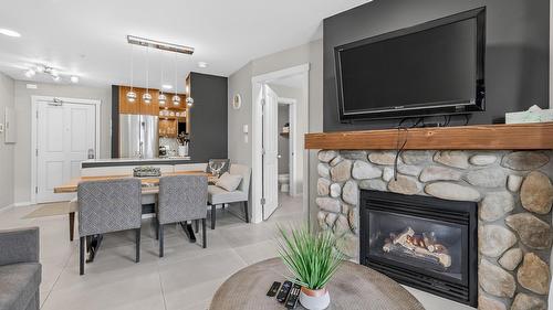 202-2050 Summit Drive, Panorama, BC - Indoor Photo Showing Other Room With Fireplace