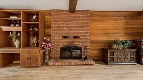 7603 De Jong Drive, Coldstream, BC - Indoor With Fireplace
