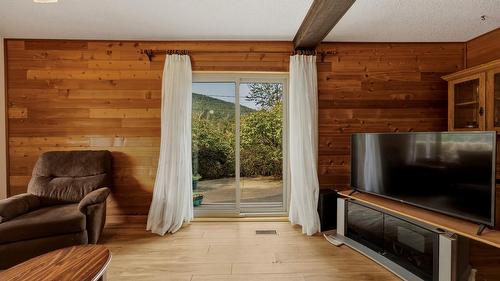 7603 De Jong Drive, Coldstream, BC - Indoor With Fireplace