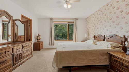 7603 De Jong Drive, Coldstream, BC - Indoor Photo Showing Bedroom