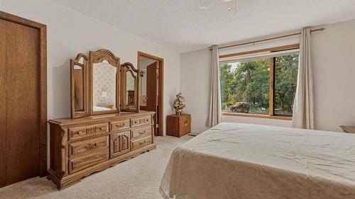 7603 De Jong Drive, Coldstream, BC - Indoor Photo Showing Bedroom