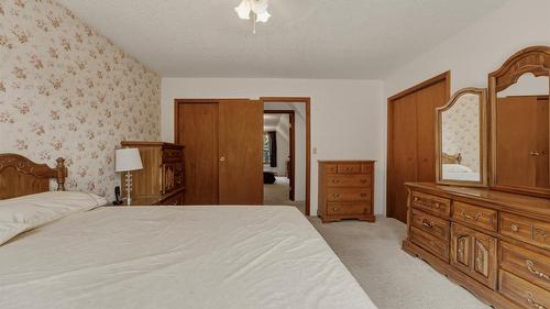 7603 De Jong Drive, Coldstream, BC - Indoor Photo Showing Bedroom