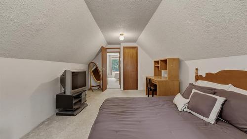 7603 De Jong Drive, Coldstream, BC - Indoor Photo Showing Bedroom