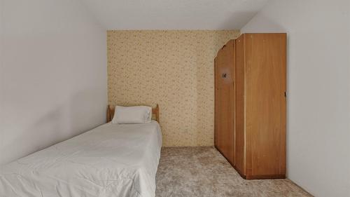 7603 De Jong Drive, Coldstream, BC - Indoor Photo Showing Bedroom