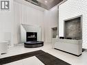 16 Concord Place Unit# 318, Grimsby, ON  - Indoor With Fireplace 