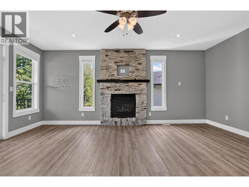 1218 Orizaba Court, Prince George, BC - Indoor Photo Showing Living Room With Fireplace