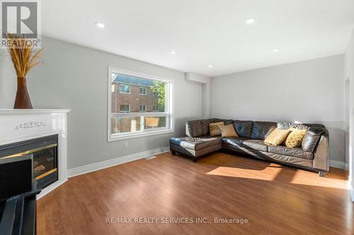 69 - 80 Acorn Place, Mississauga, ON - Indoor Photo Showing Living Room With Fireplace