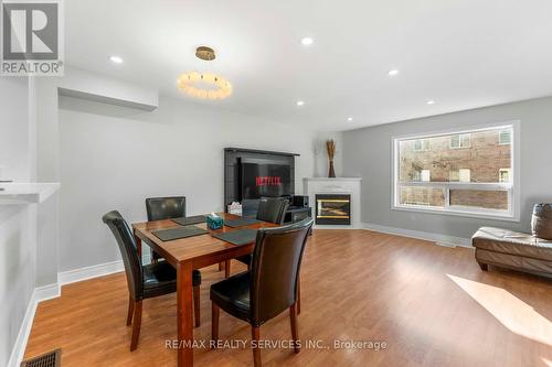 69 - 80 Acorn Place, Mississauga, ON - Indoor Photo Showing Other Room With Fireplace