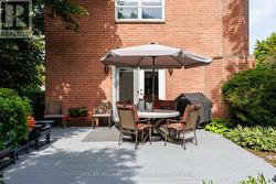 Walk-out to patio & backyard - 