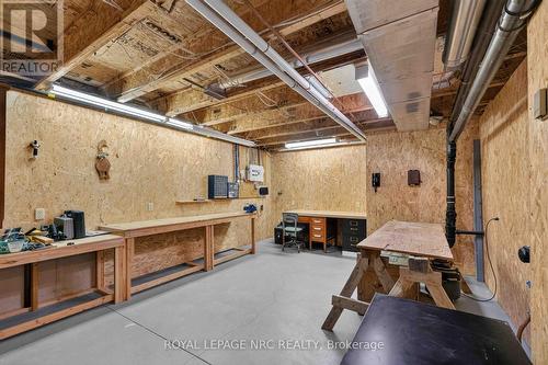 Workshop with Work Benches Included - 82 Maple Street, Port Colborne (Sugarloaf), ON - Indoor Photo Showing Basement